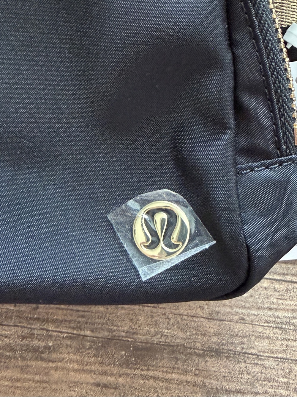 Lululemon Everywhere Belt Bag 1L Wordmark in the Black/Gold colorway - Picture 3 of 6